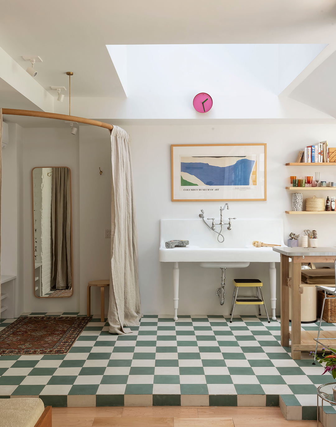 Checkerboard tile floor and sink