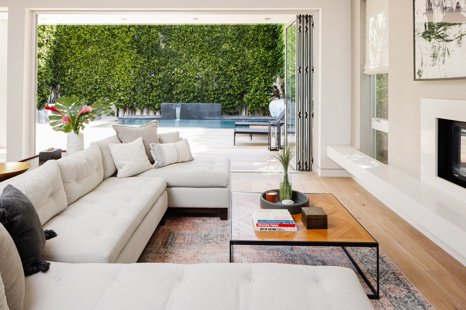 White l-shaped sofa in an open living room