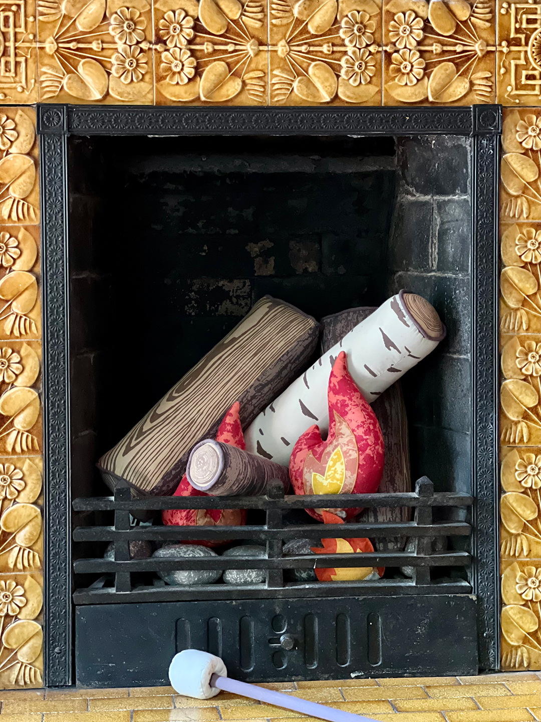 fake toys in fireplace