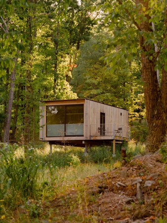 Cabin surrounded by woods