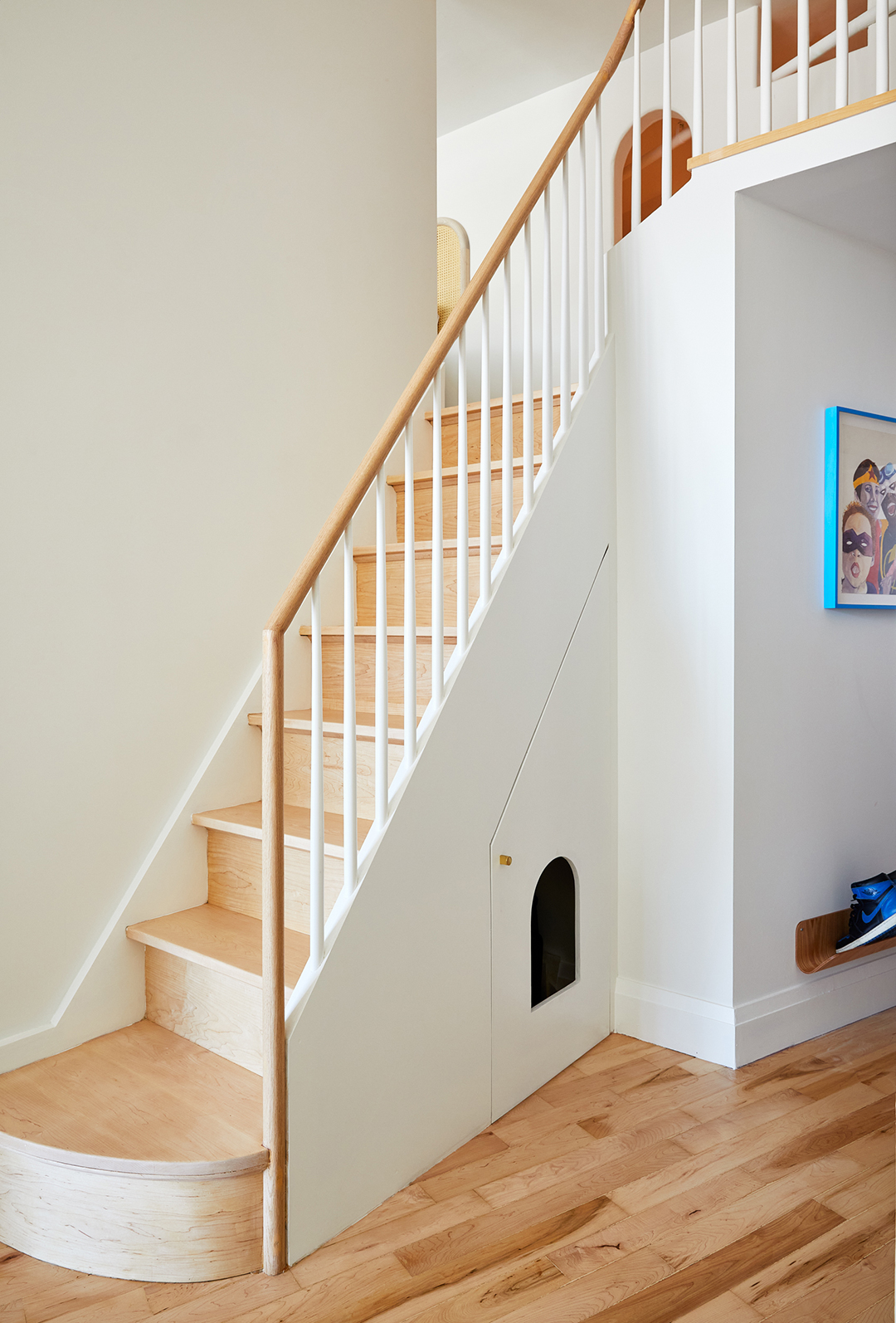 cat door built into side of stairs