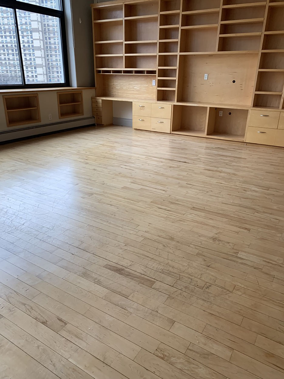 living room built-in bookshelves in the middle of being built