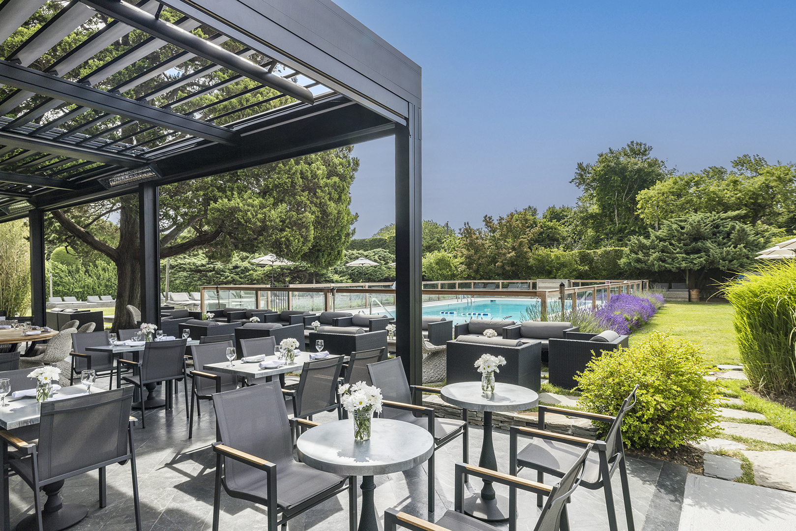 outdoor patio overlooking a pool