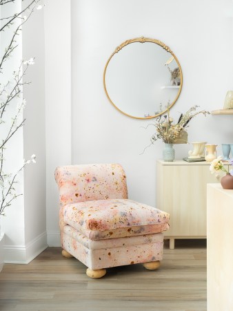 armless lounge chair with flower-dyed speckled upholstery