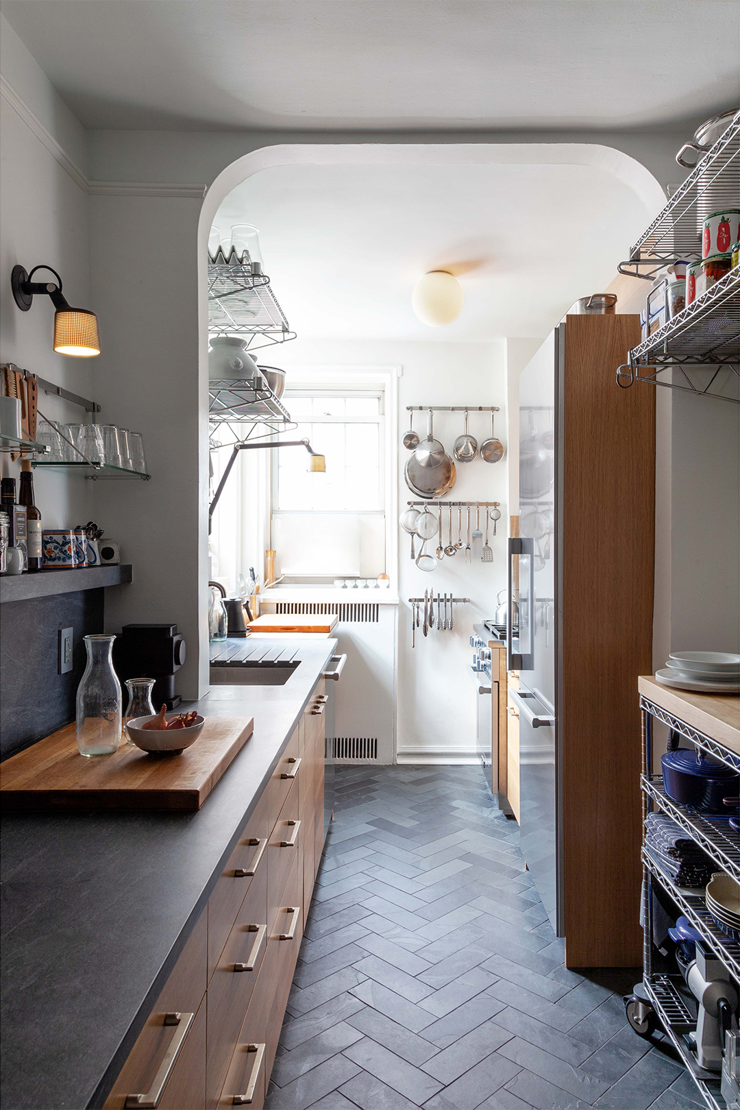 galley kitchen with slate floors