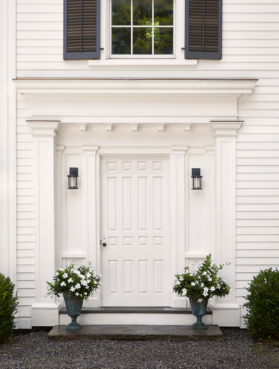 white clapboard farmhouse exterior