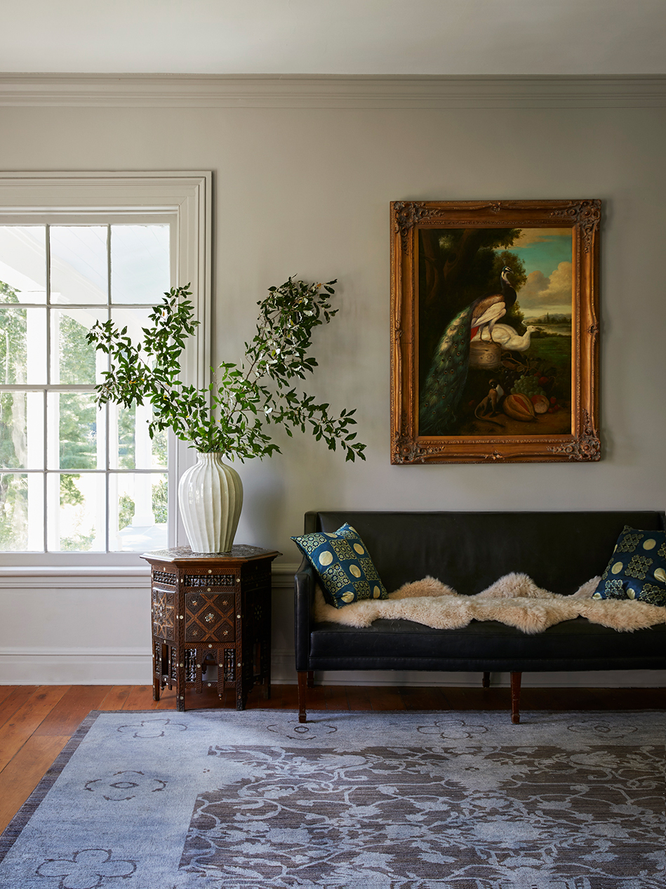 sofa with sheepskin throw in dining room