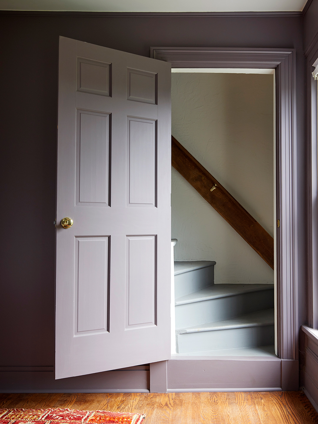 lilac door leading to staircase