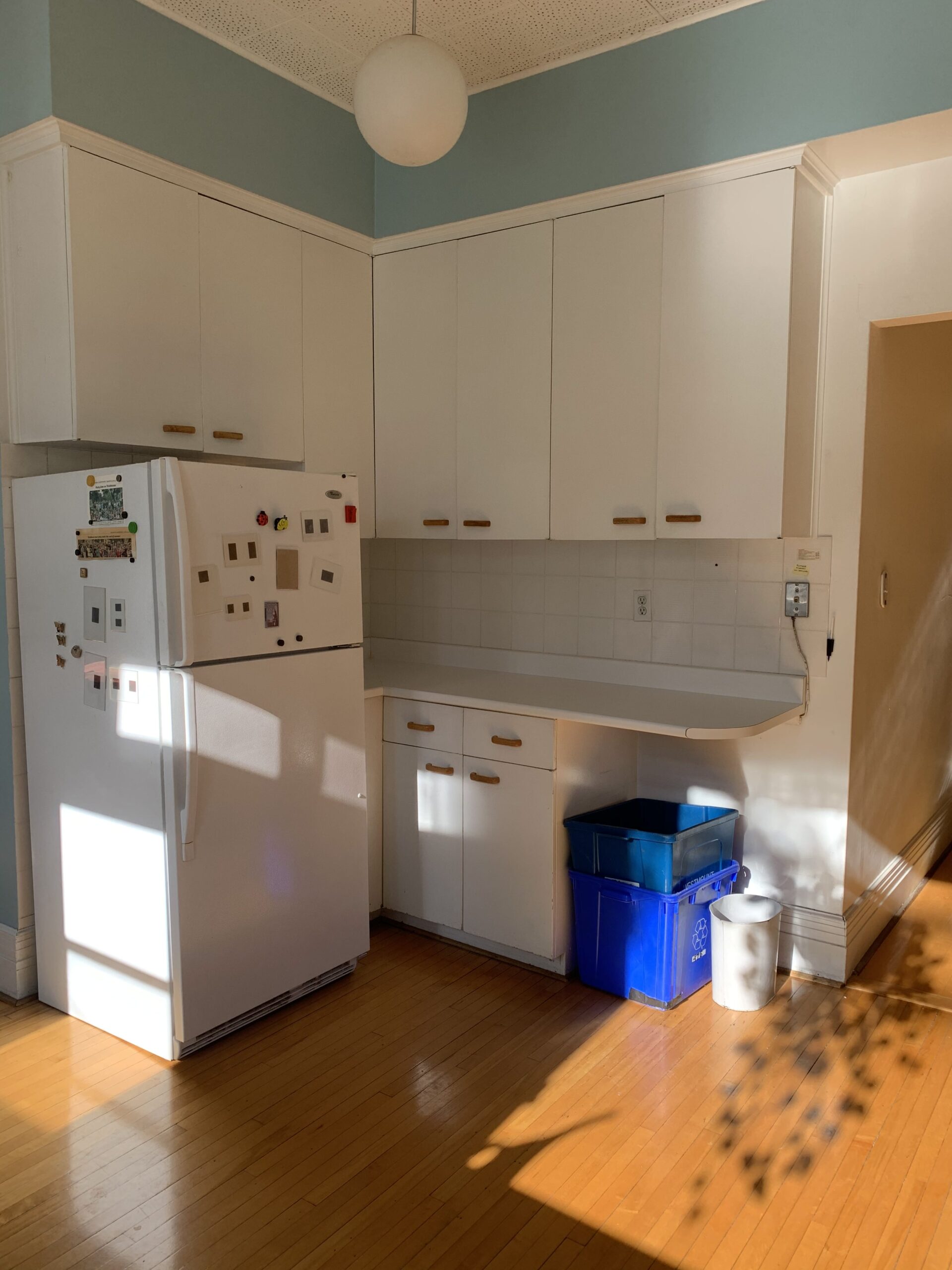 old white kitchen with white fridge