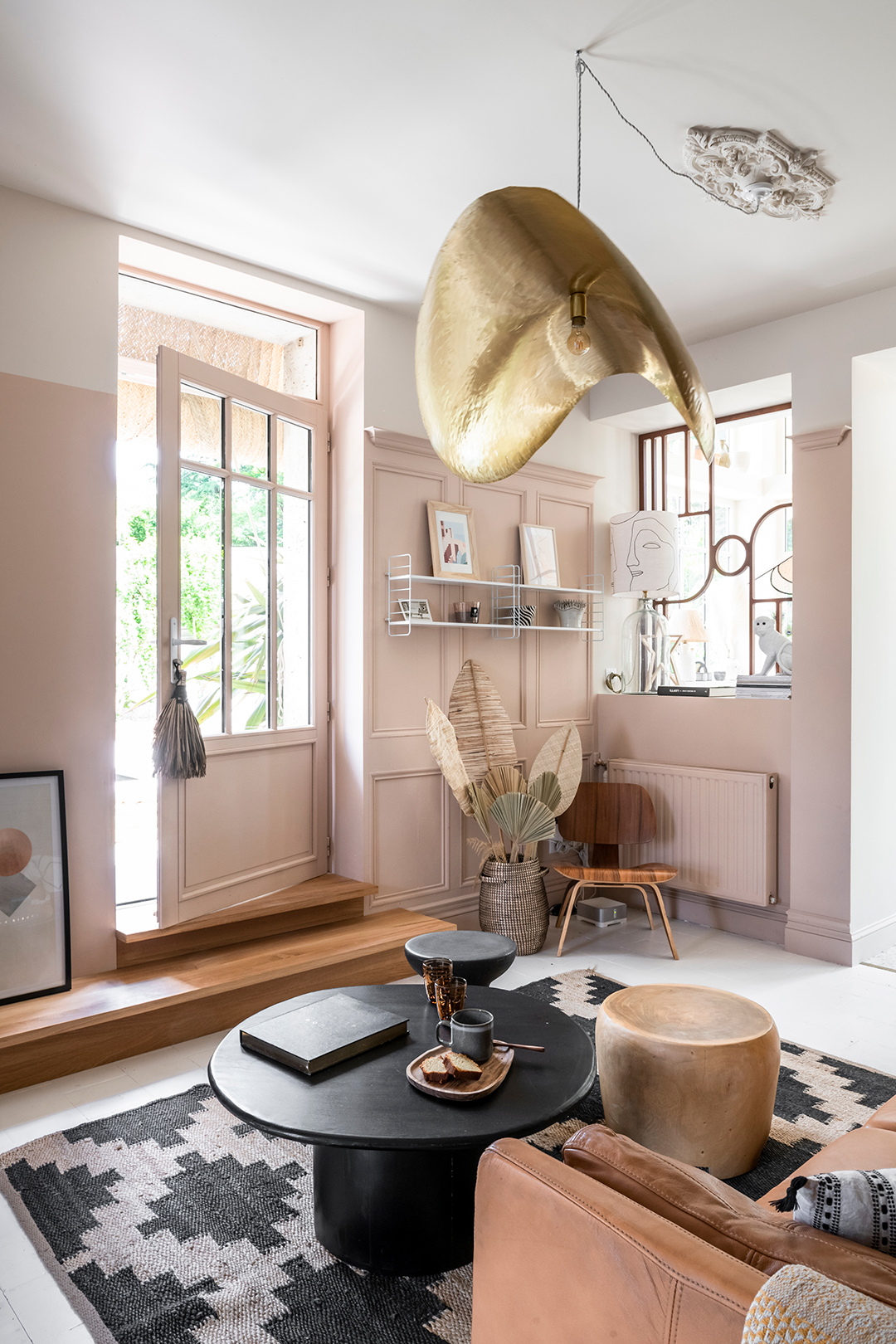 gold pendant over coffee table