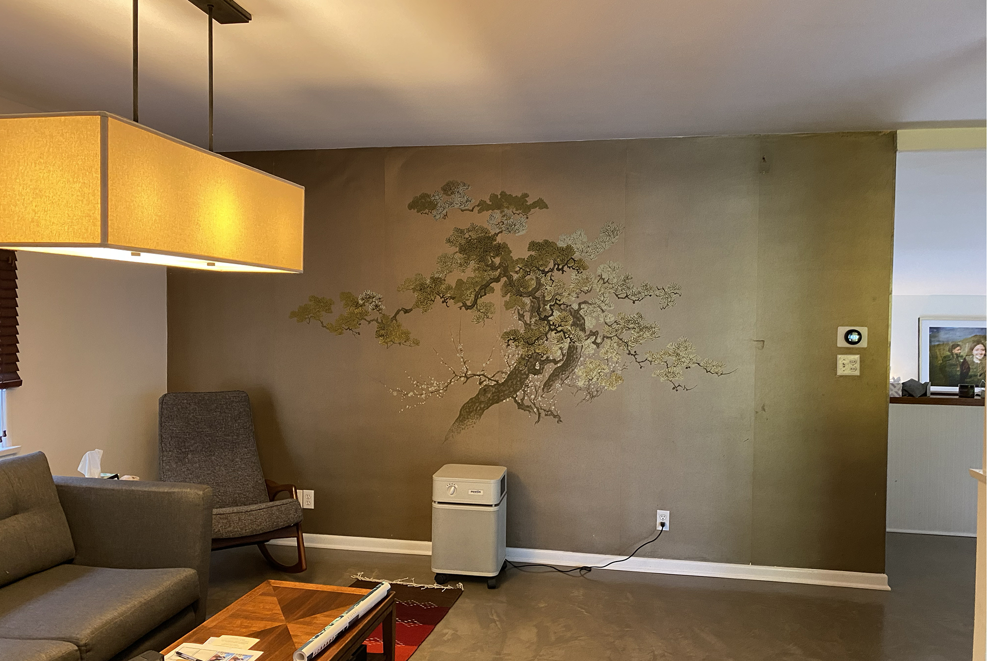 empty living room with tree wallpaper