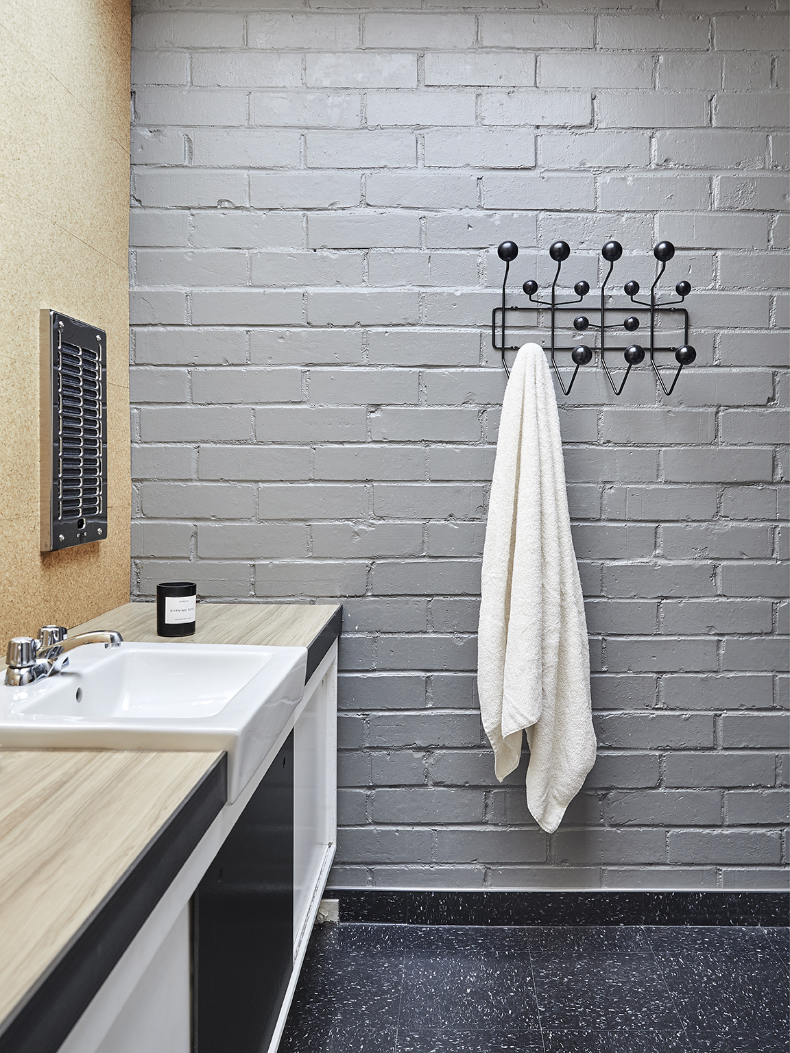modern bathroom with gray brick wall