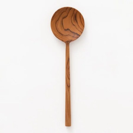  Teak round salad spoon against a white background.