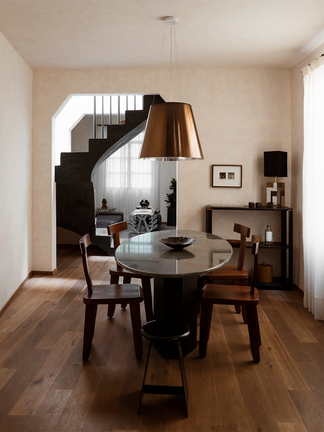 copper light over dining table