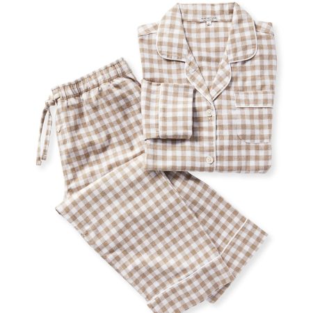  Brown and white flannel pajamas against a white background.