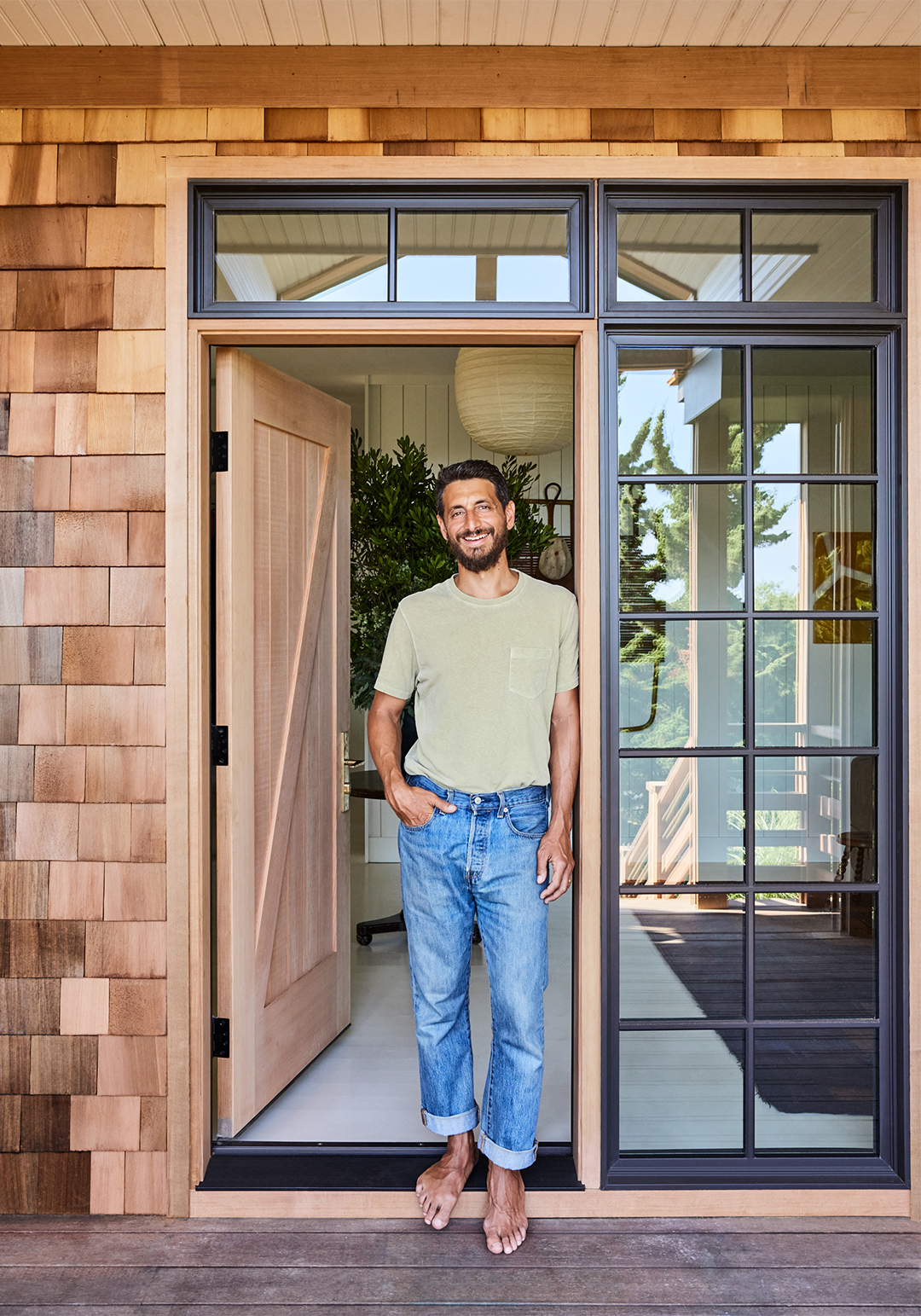 man standing in doorway