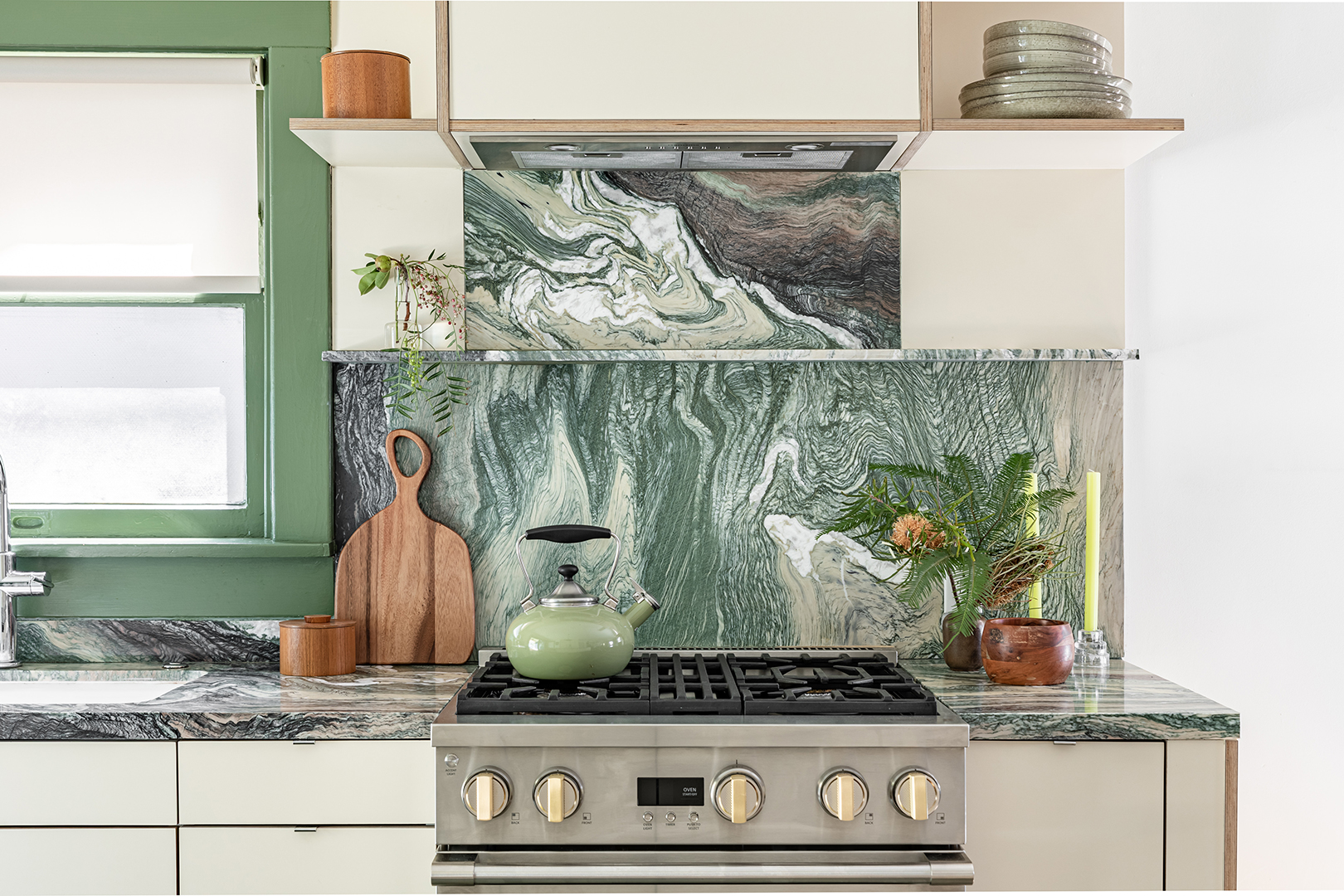 Kitchen with green marble backsplash