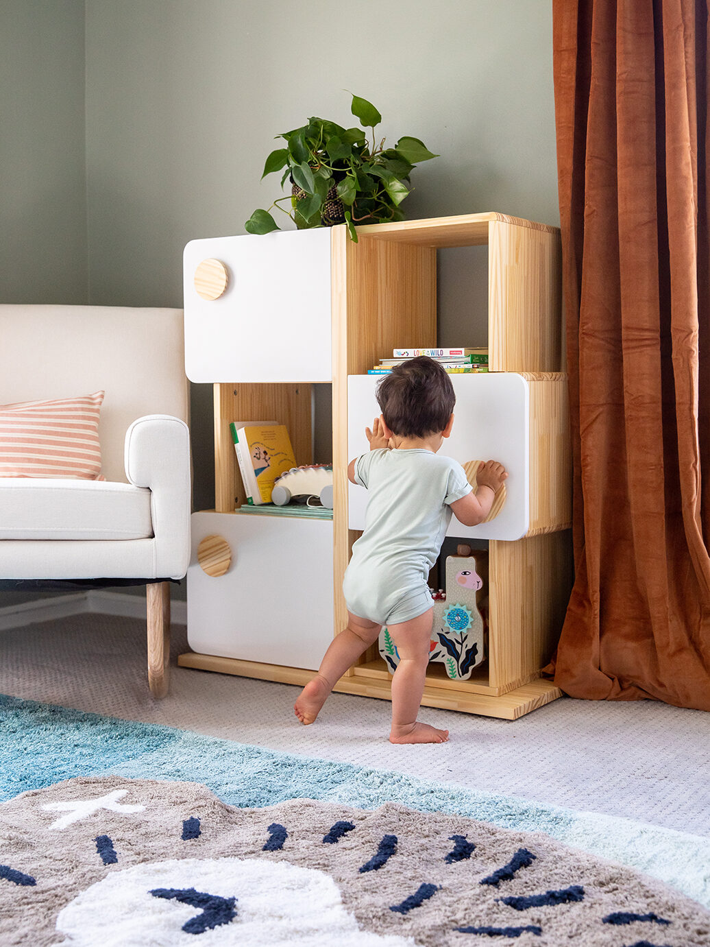 baby near shelf