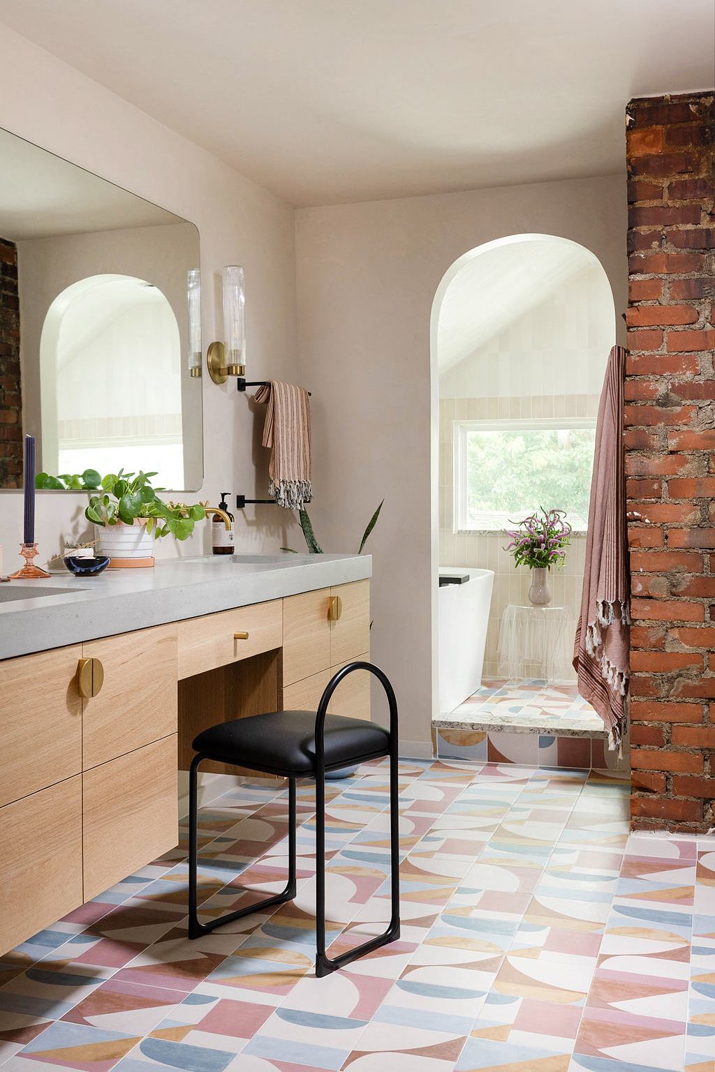 wood vanity and bold floro tile