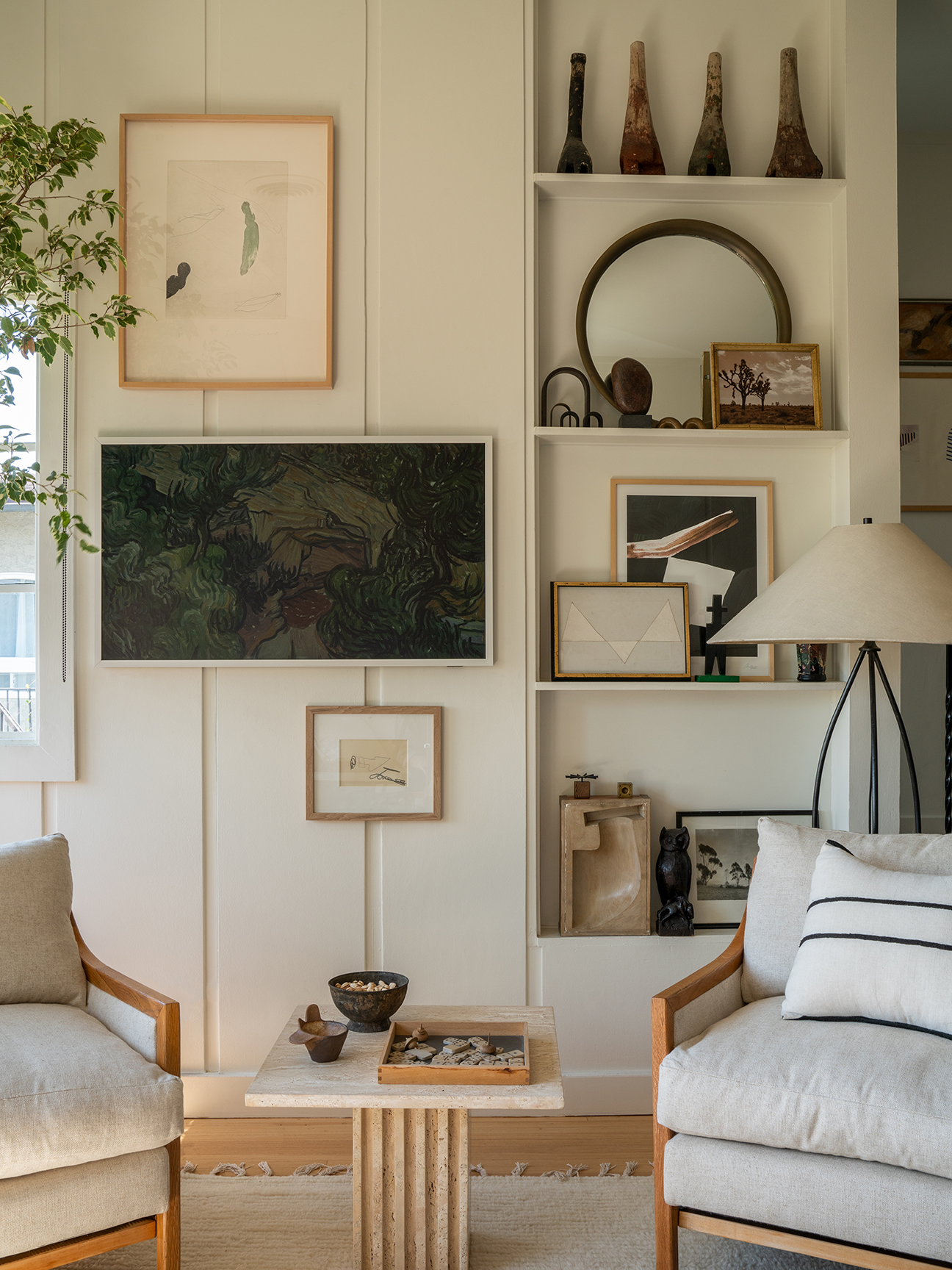 gallery wall on white paneling