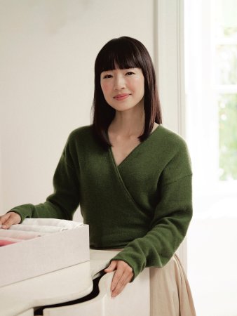 marie kondo in a green sweater