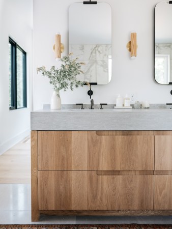 wood vanity with concrete sink