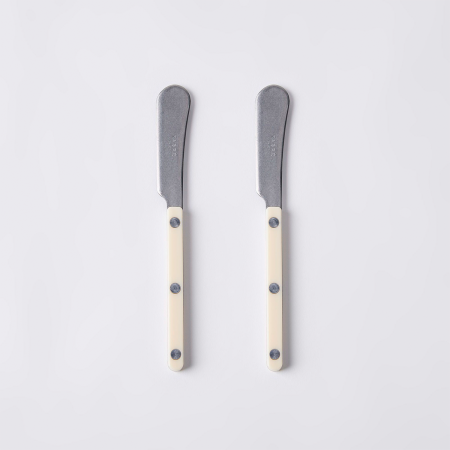  two ivory butter knives