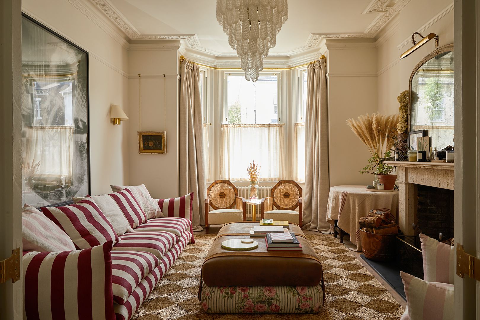 seagrass rug and striped sofa