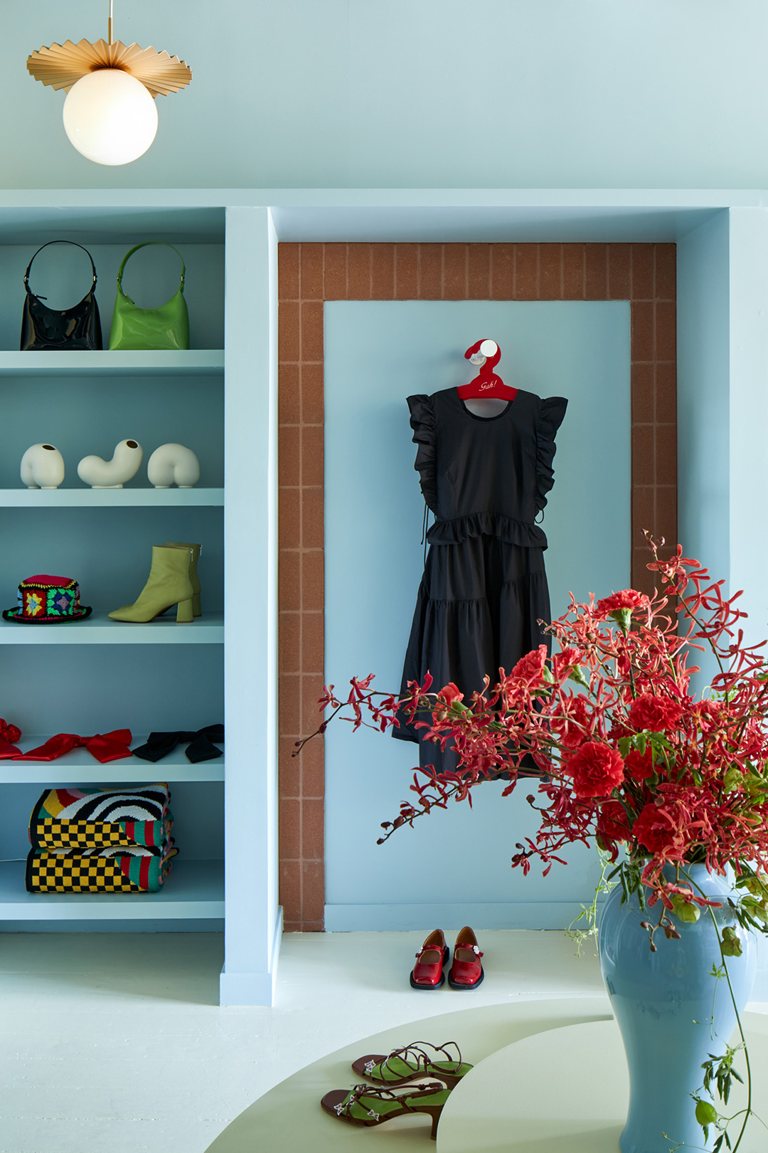 Brick veneer surrounding a dress hanging