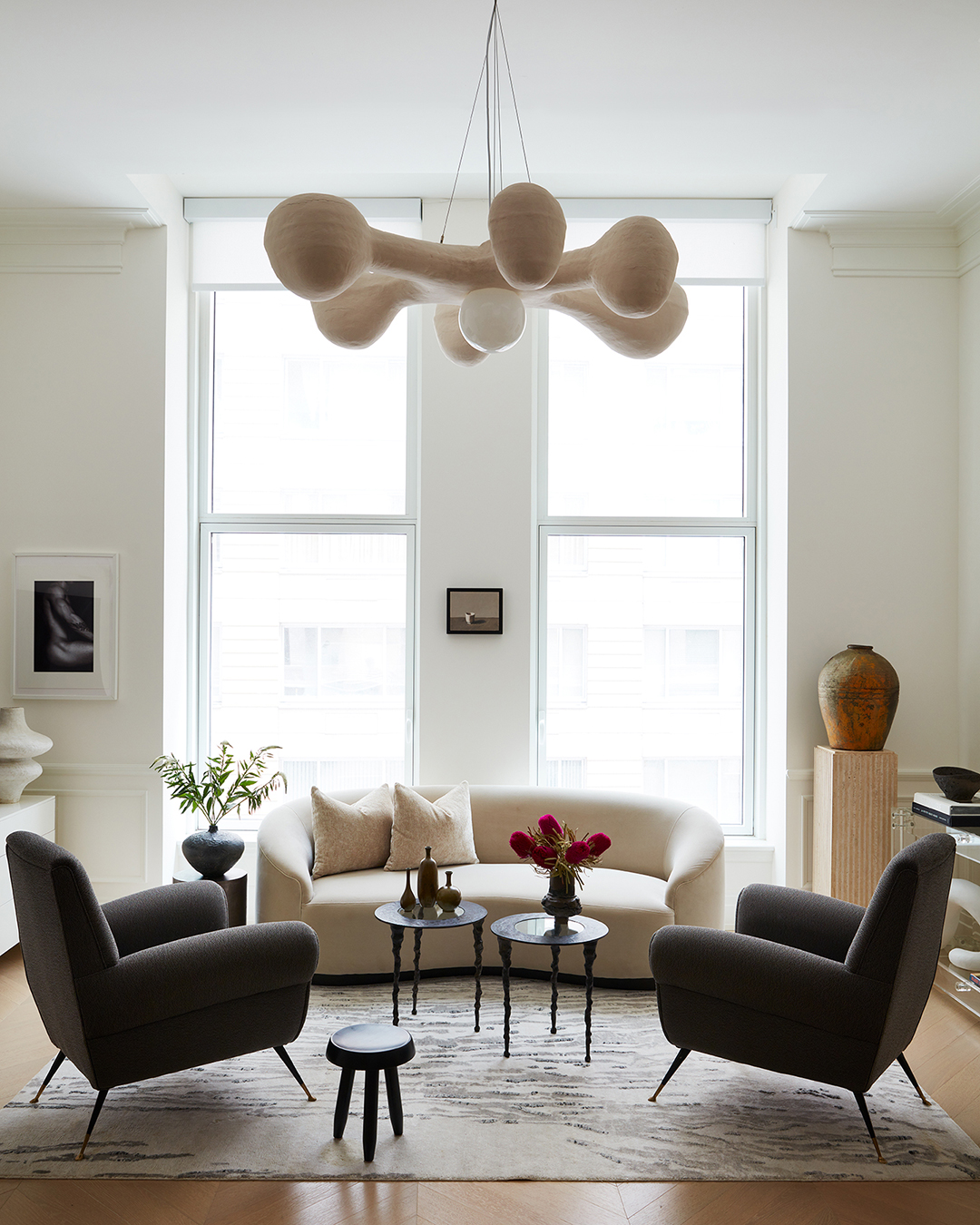 Living room with curved sofa