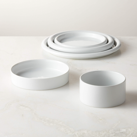  Low plates in shiny white porcelain rolled rims on plates, bowls, and