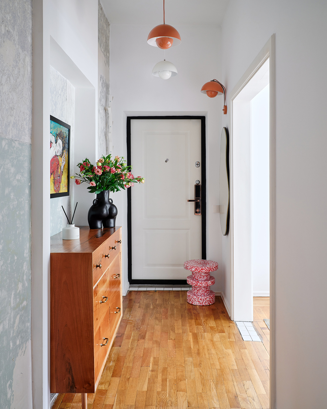 modern hallway with wood credenza