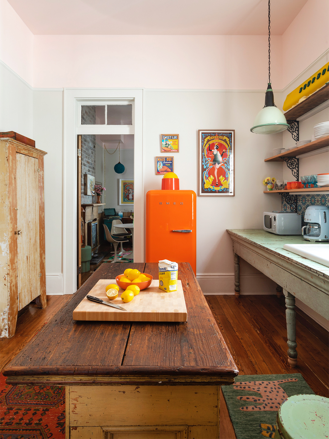 retro kitchen with orange fridge