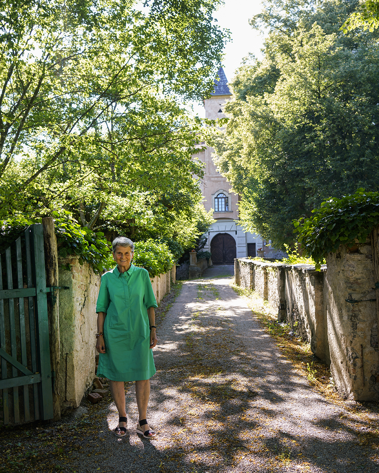 woman standing in walkway