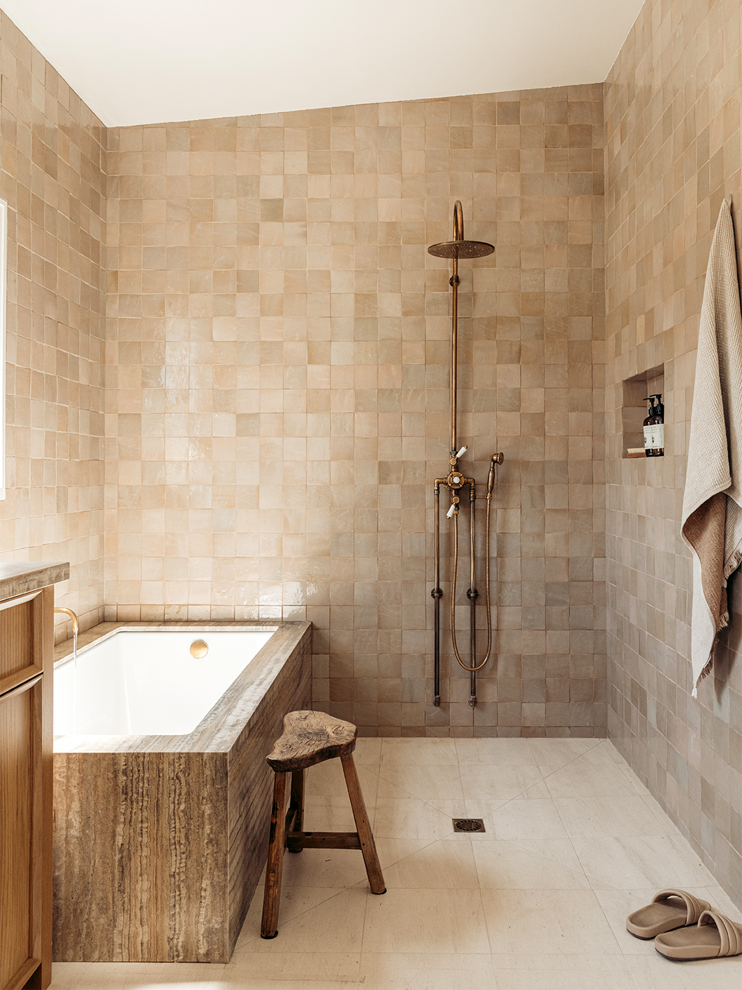 stone clad tub and openshower