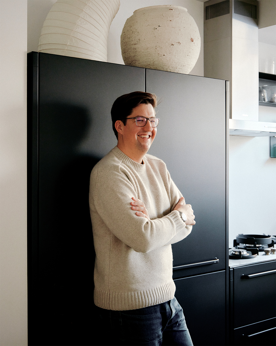 man standing in front of fridge