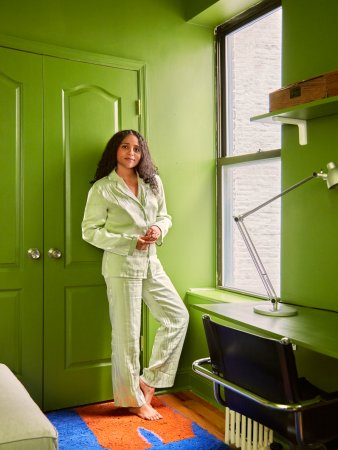 woman leaning on door