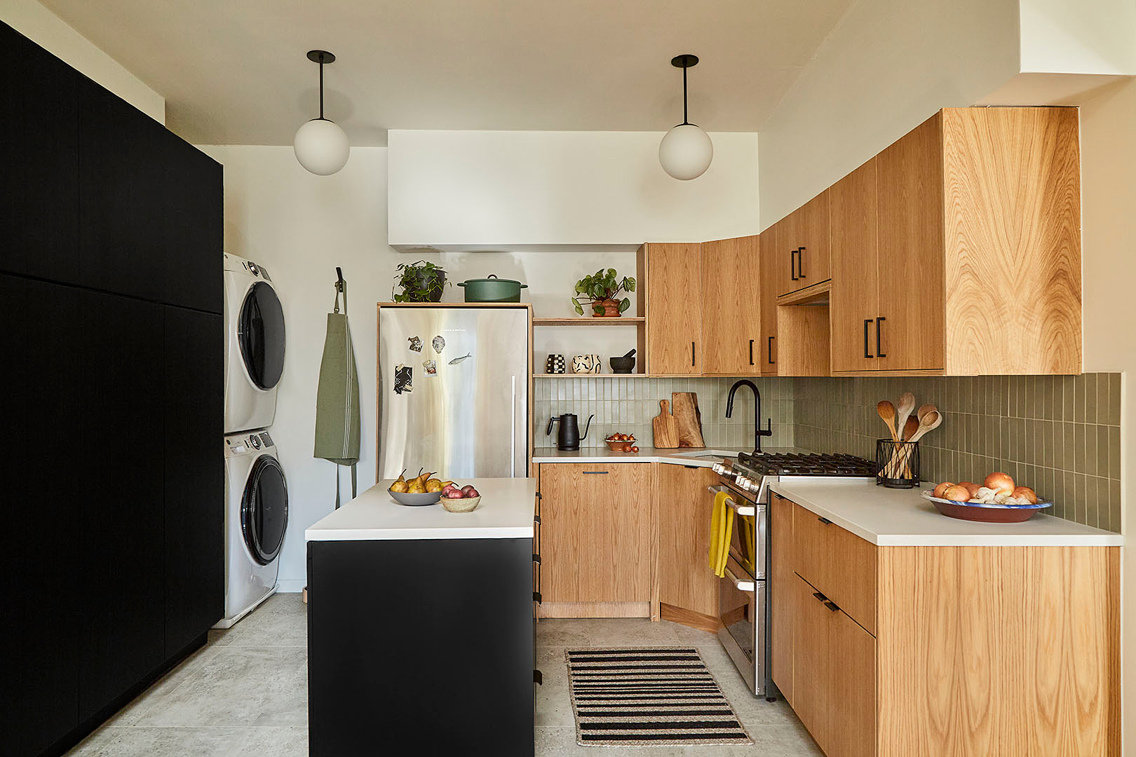 wood kitchen with black island