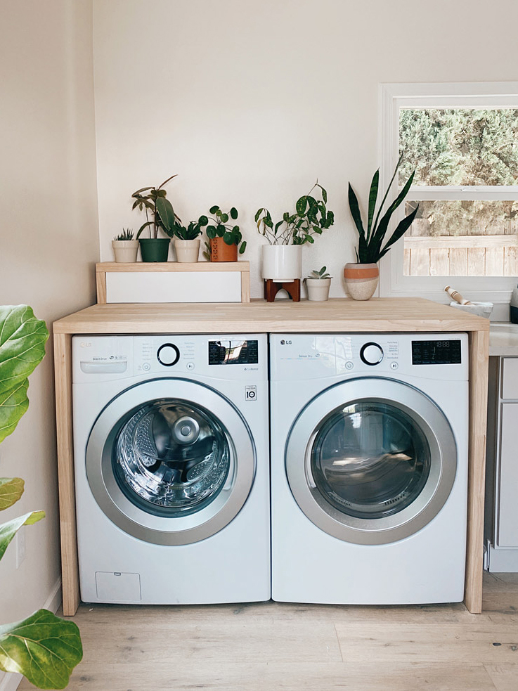 washer dryer under wood counter