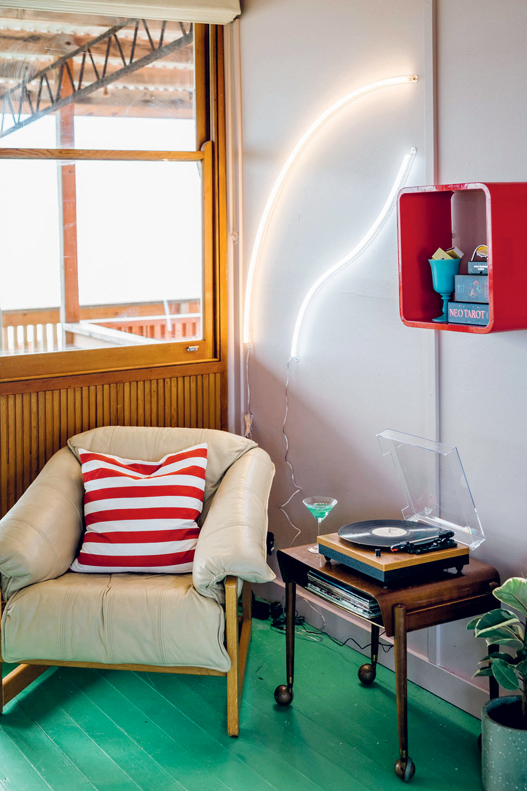 Reading nook with cream-colored chair