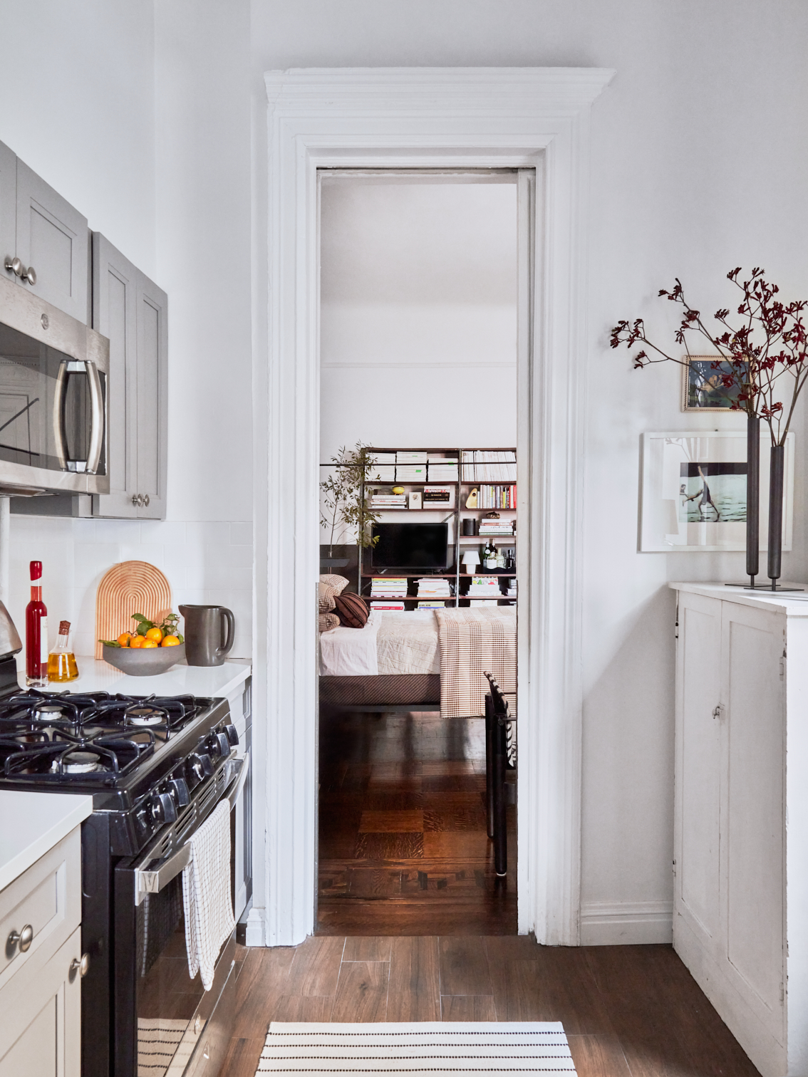 view from kitchen to bed