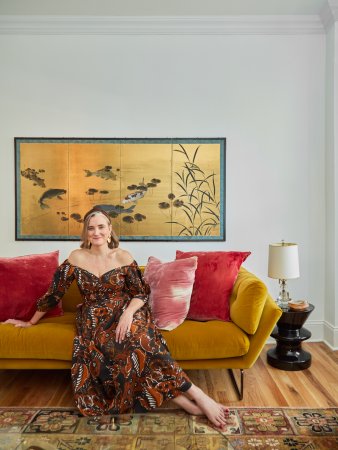 woman on yellow sofa