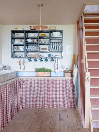 red curtains under countertop