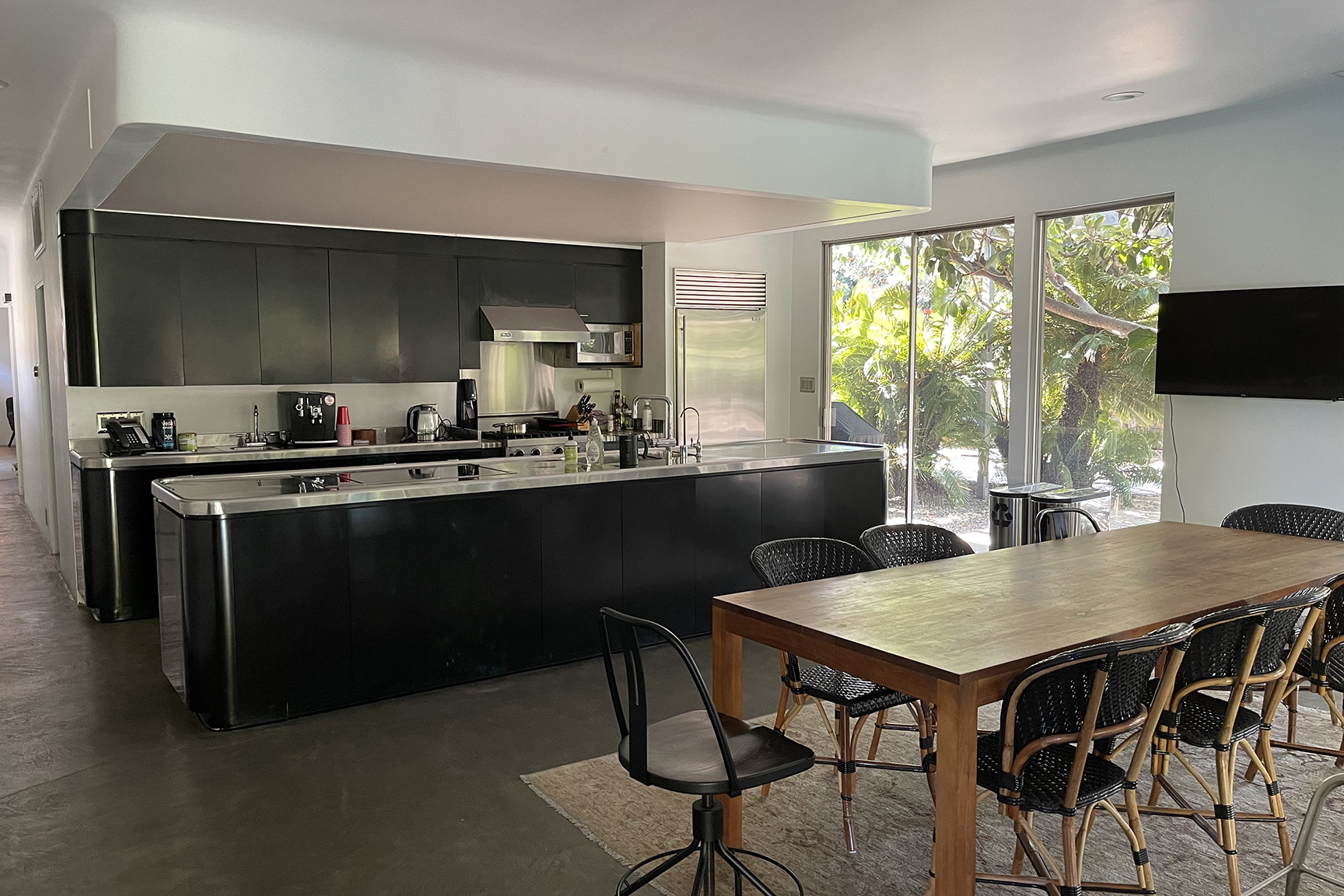 1970s black IKEA kitchen and dining area