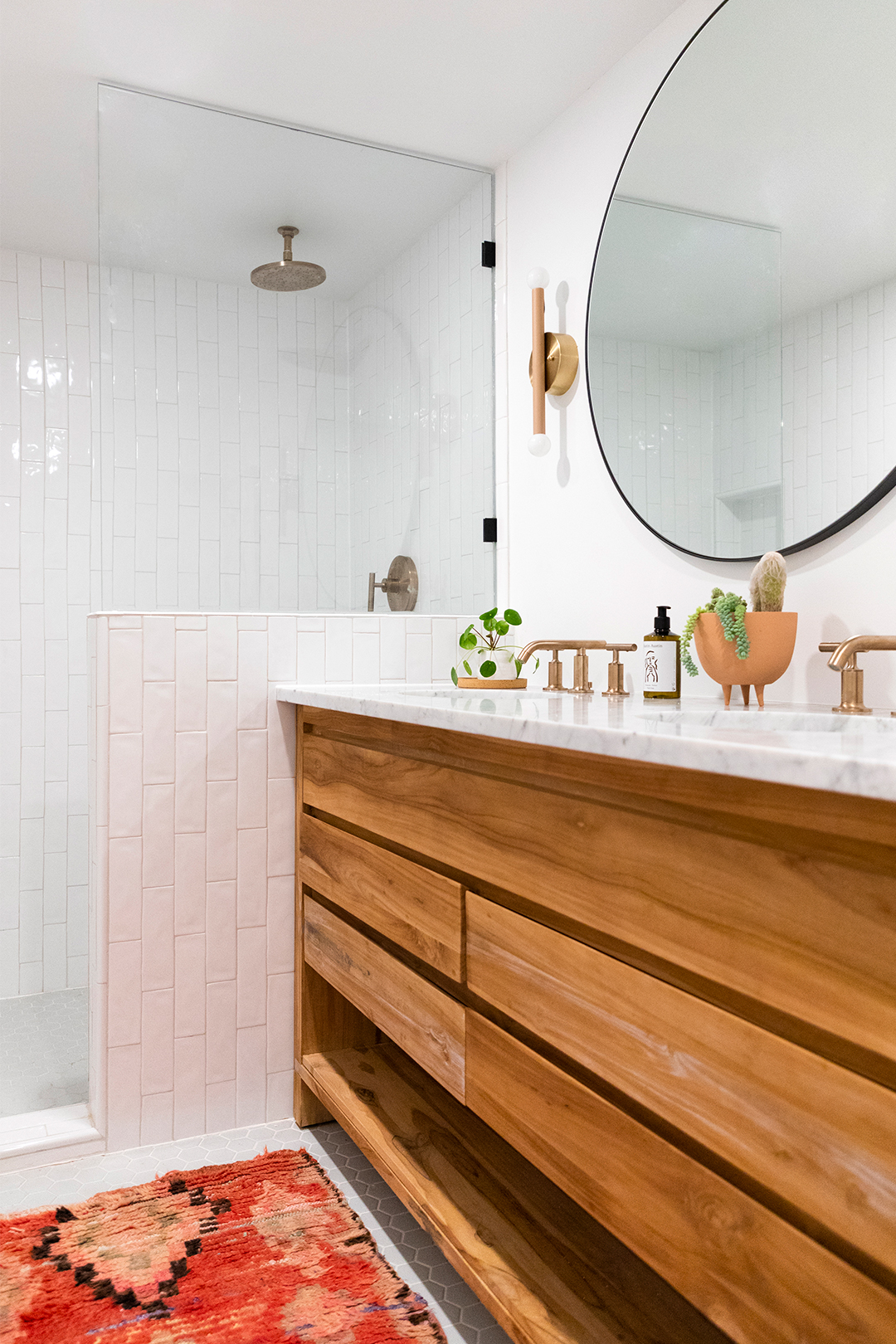 Subway tile bathroom with wooden vanity