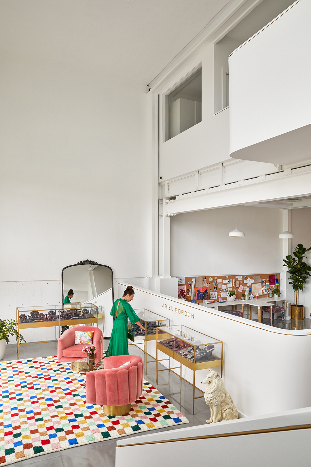 White office space with colorful checkerboard rug