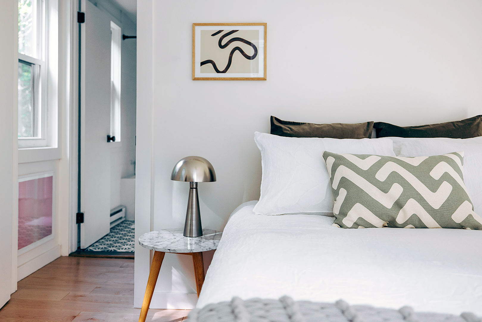 Shot of bedroom with white sheets