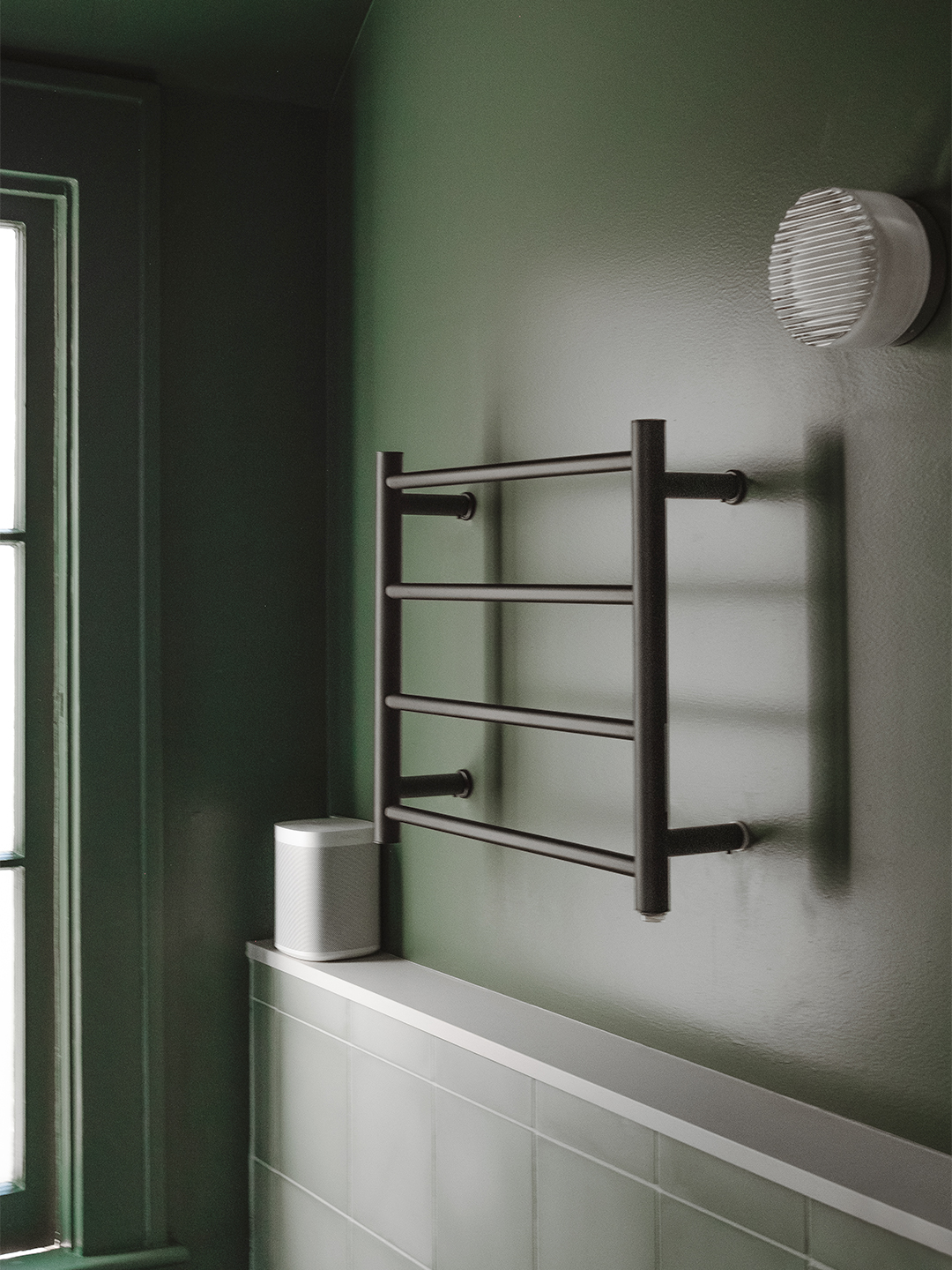 green towel warmer