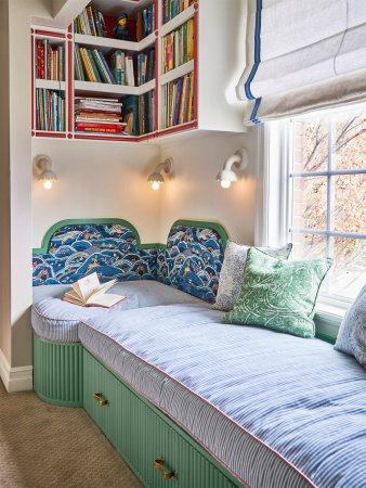 corner of reading nook with curved patterned backboard