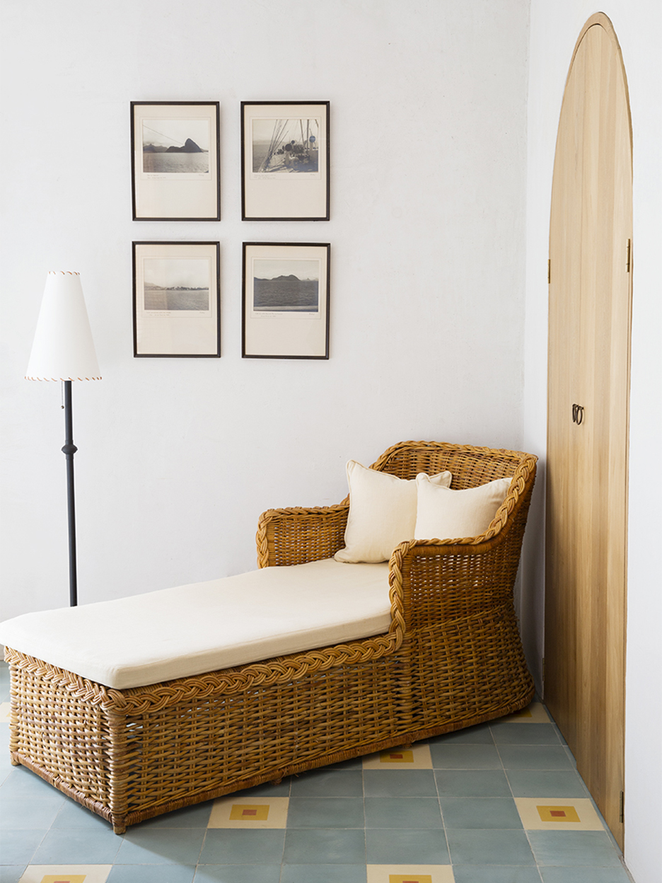 wicker lounge chair in corner